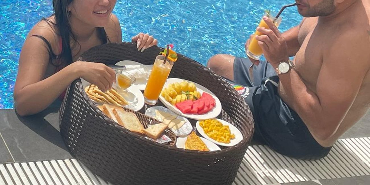 Three nights, breakfast in the pool — Vang Vieng